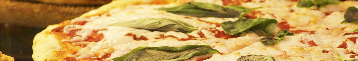 Eating Italian Pizza at Cafe Riviera restaurant in Wilmington, DE.
